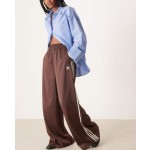 adidas Originals Adicolor satin wide leg track pants in brown