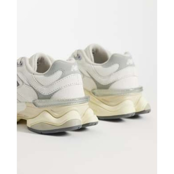 New Balance 9060 sneakers in white with gray metallic detail