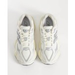 New Balance 9060 sneakers in white with gray metallic detail