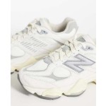 New Balance 9060 sneakers in white with gray metallic detail