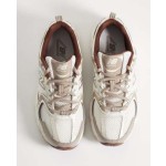 New Balance 530 sneakers in white and brown