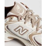 New Balance 530 sneakers in white and brown