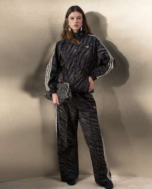 adidas Originals x ASOS track pants in brown zebra print