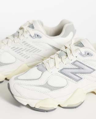 New Balance 9060 sneakers in white with gray metallic detail