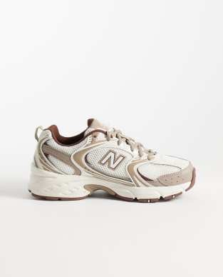 New Balance 530 sneakers in white and brown