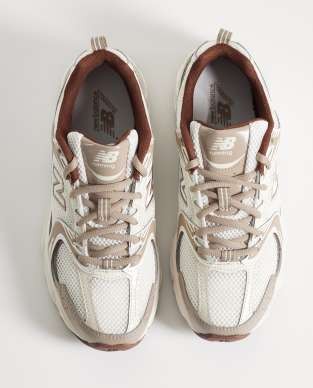 New Balance 530 sneakers in white and brown